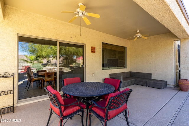 view of patio / terrace featuring ceiling fan