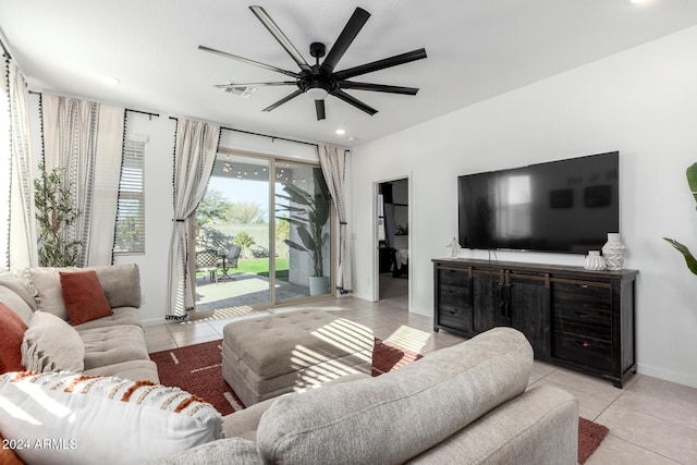 tiled living room featuring ceiling fan