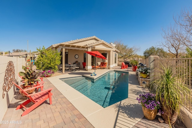 view of pool with a patio, a fenced backyard, and a fenced in pool