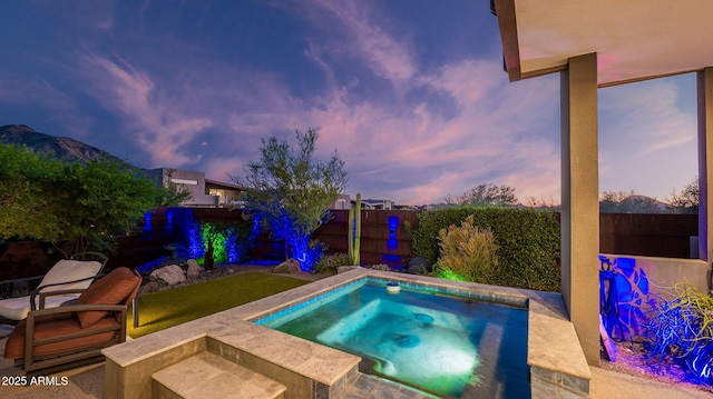 6525 E Cave Creek Rd Unit 40, Cave Creek, AZ 85331 - view of swimming pool featuring an in-ground hot tub and a fenced backyard