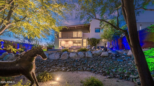 6525 E Cave Creek Rd Unit 40, Cave Creek, AZ 85331 - back of house with a balcony, a jacuzzi, stucco siding, and a patio