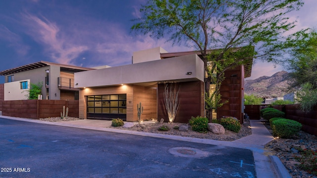6525 E Cave Creek Rd Unit 40, Cave Creek, AZ 85331 - contemporary home featuring stucco siding, a garage, and driveway
