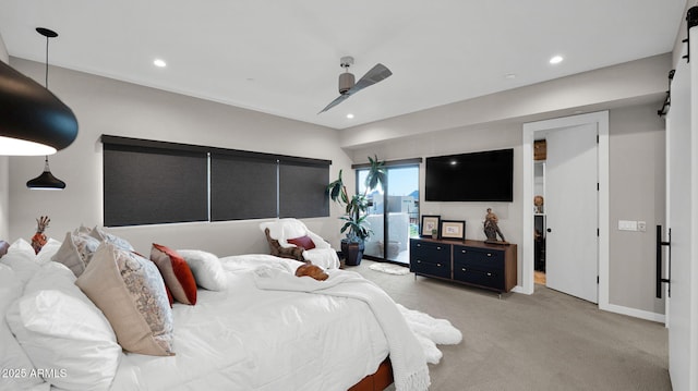 6525 E Cave Creek Rd Unit 40, Cave Creek, AZ 85331 - bedroom featuring light colored carpet, access to exterior, ceiling fan, recessed lighting, and a barn door