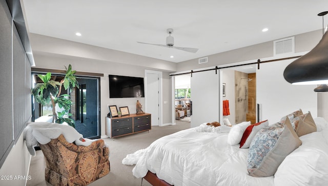 6525 E Cave Creek Rd Unit 40, Cave Creek, AZ 85331 - bedroom featuring light colored carpet, a barn door, access to outside, recessed lighting, and a ceiling fan