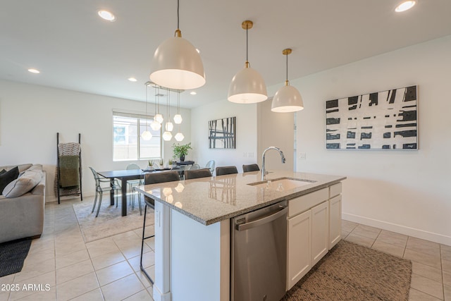 21595 S 225th Way, Queen Creek, AZ 85142 - kitchen with light stone countertops, dishwasher, a sink, light tile patterned floors, and open floor plan