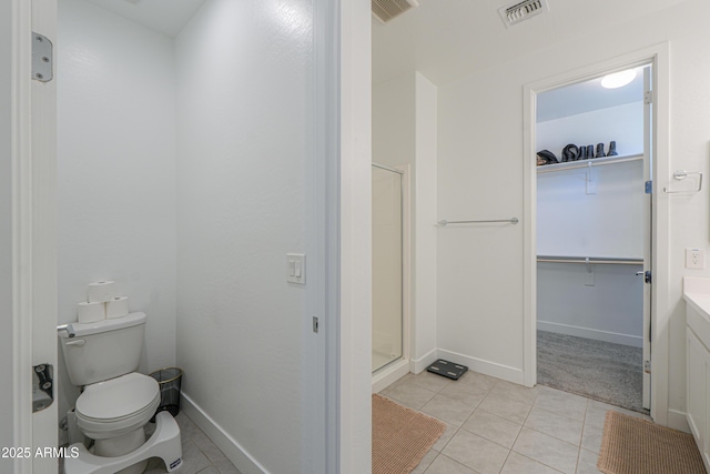 21595 S 225th Way, Queen Creek, AZ 85142 - full bathroom featuring a walk in closet, tile patterned flooring, a shower stall, and visible vents