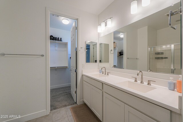 21595 S 225th Way, Queen Creek, AZ 85142 - bathroom featuring a sink, a spacious closet, and a shower stall