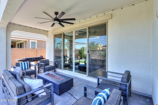 21595 S 225th Way, Queen Creek, AZ 85142 - view of patio / terrace with fence, a ceiling fan, and an outdoor living space with a fire pit