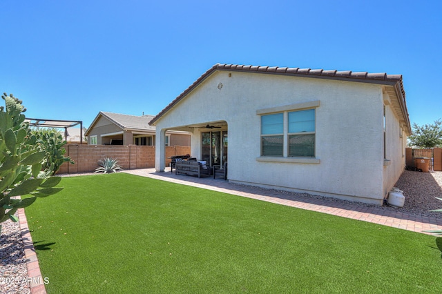 21595 S 225th Way, Queen Creek, AZ 85142 - back of house featuring a yard, a patio, a ceiling fan, and a fenced backyard