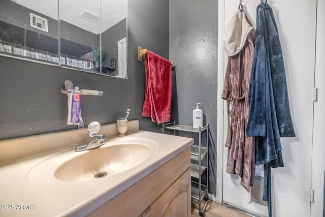 4417 W Sandra Cir, Glendale, AZ 85308 - bathroom featuring visible vents and vanity