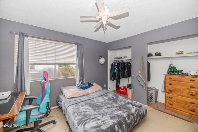 4417 W Sandra Cir, Glendale, AZ 85308 - bedroom featuring a textured ceiling, a closet, and ceiling fan