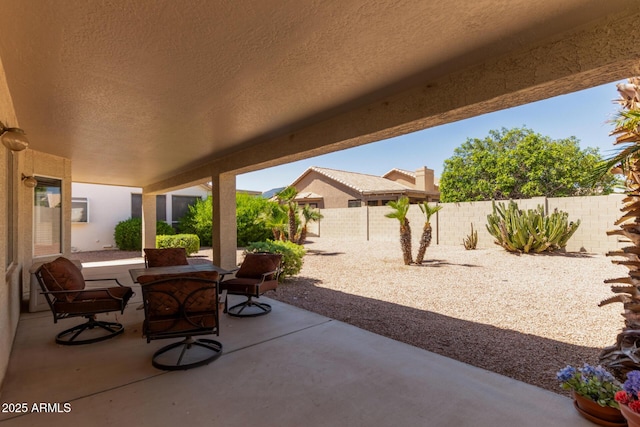 view of patio with a fenced backyard