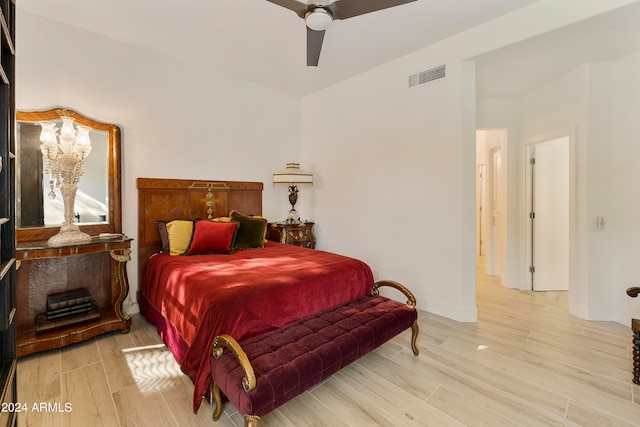 bedroom featuring light hardwood / wood-style flooring and ceiling fan