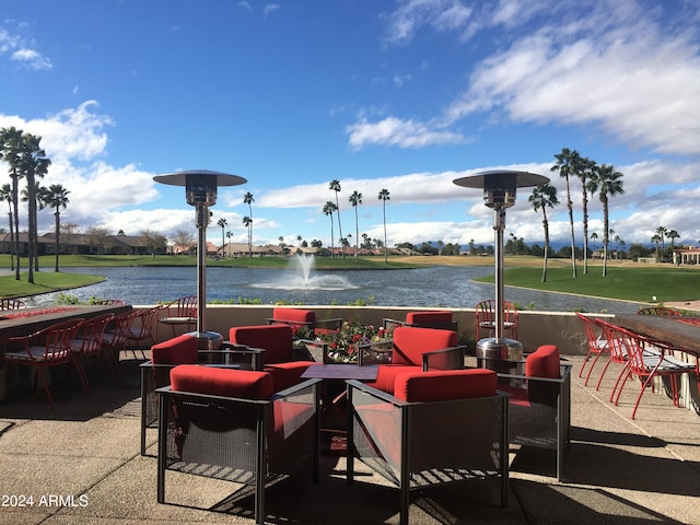 view of patio featuring a water view