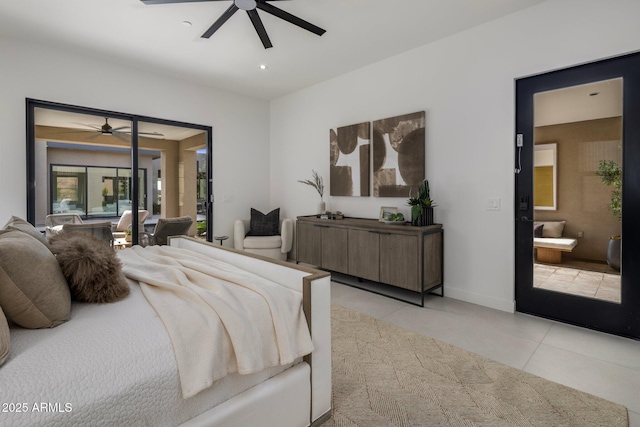 tiled bedroom featuring french doors, access to outside, ceiling fan, and ensuite bathroom