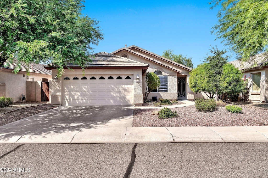 view of front of property featuring a garage