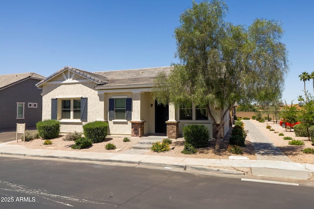 324 N 56th Pl, Mesa, AZ 85205 - view of front facade with stucco siding and a tile roof