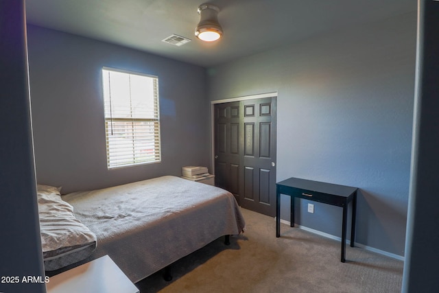 324 N 56th Pl, Mesa, AZ 85205 - bedroom featuring carpet flooring, a closet, and baseboards