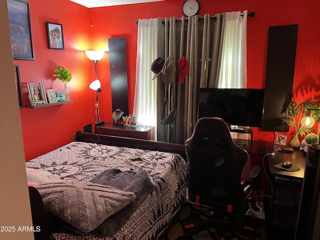 bedroom featuring a textured ceiling