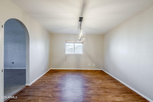 unfurnished dining area featuring hardwood / wood-style flooring