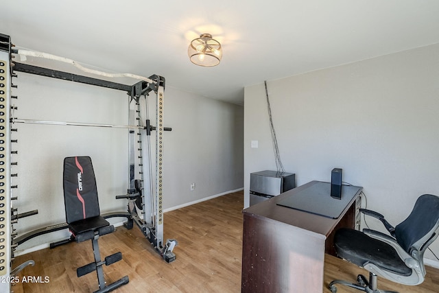 office with light wood-type flooring