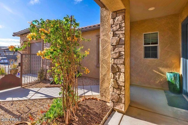 view of patio / terrace with a gate and fence