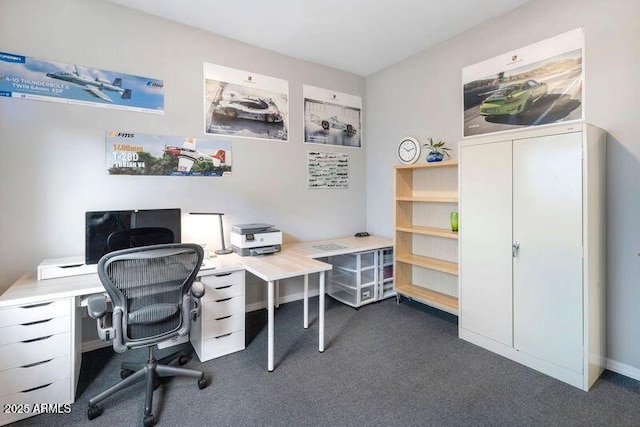 office space featuring dark colored carpet