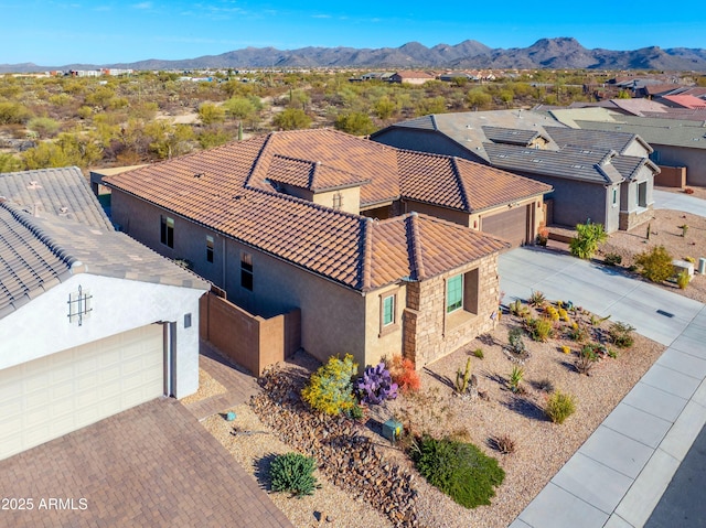 drone / aerial view with a residential view and a mountain view