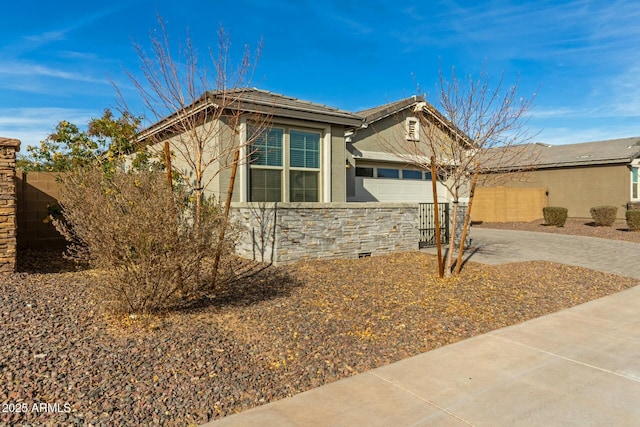 view of property exterior featuring a garage