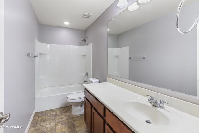 bathroom featuring visible vents, toilet,  shower combination, baseboards, and vanity