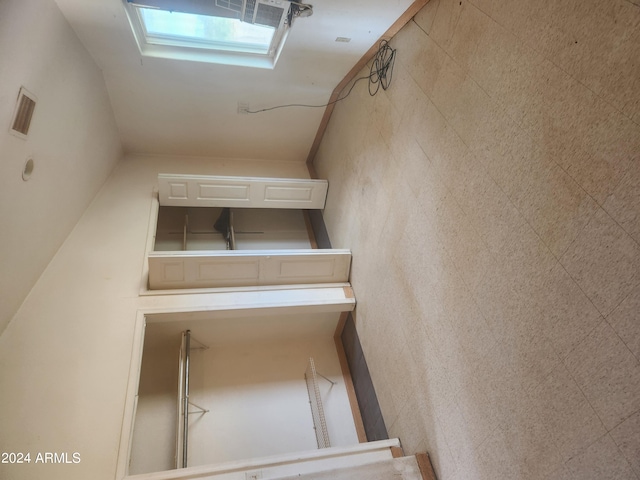 interior space featuring white cabinets