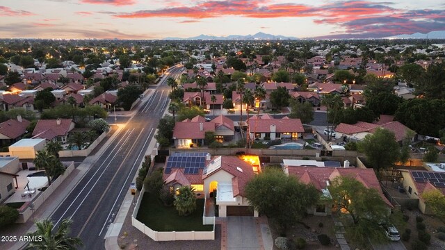 aerial view of residential area with a mountainous background