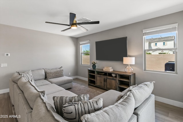 5430 W Notch Hill Rd, Laveen, AZ 85339 - living area with ceiling fan, baseboards, and wood finished floors
