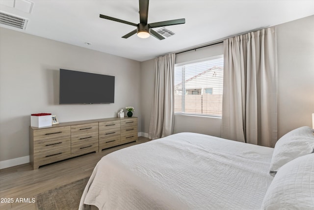 5430 W Notch Hill Rd, Laveen, AZ 85339 - bedroom with baseboards, light wood-type flooring, and ceiling fan