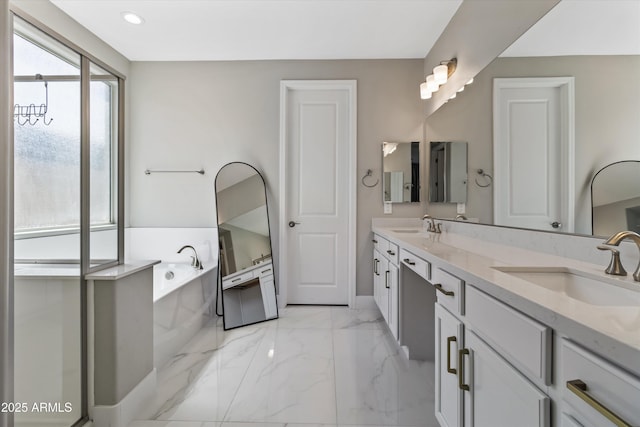 5430 W Notch Hill Rd, Laveen, AZ 85339 - bathroom featuring double vanity, a bath, marble finish flooring, baseboards, and recessed lighting