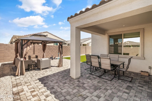5430 W Notch Hill Rd, Laveen, AZ 85339 - view of patio with outdoor lounge area, a gazebo, outdoor dining area, and a fenced backyard