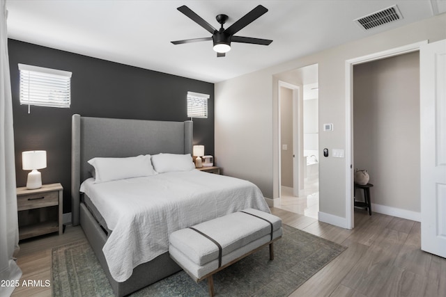 5430 W Notch Hill Rd, Laveen, AZ 85339 - bedroom featuring light wood-style flooring, baseboards, and a ceiling fan