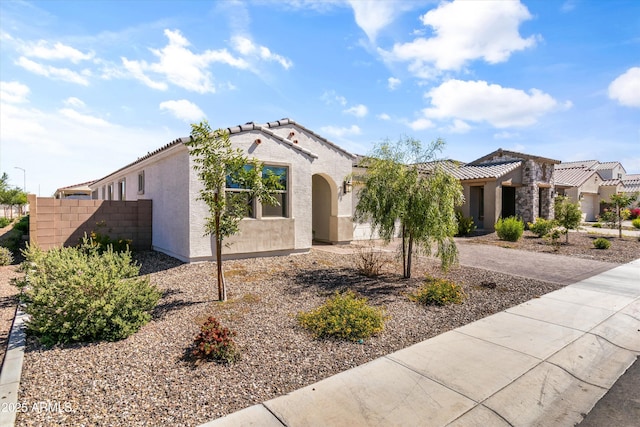 5430 W Notch Hill Rd, Laveen, AZ 85339 - mediterranean / spanish-style home with stucco siding, fence, and a tile roof