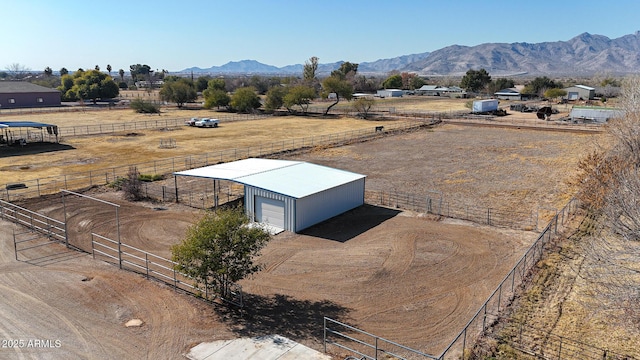 bird's eye view with a mountain view and a rural view