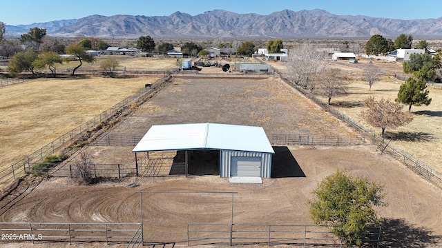 aerial view featuring a mountain view and a rural view