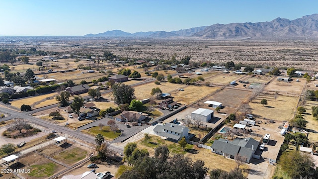 birds eye view of property featuring a mountain view