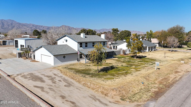 aerial view featuring a mountain view