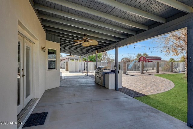 view of patio featuring ceiling fan and grilling area