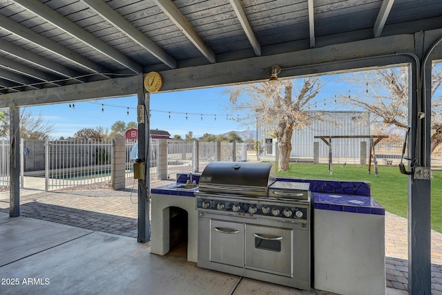 view of patio / terrace featuring area for grilling and grilling area