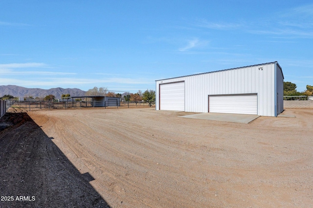 garage featuring a mountain view