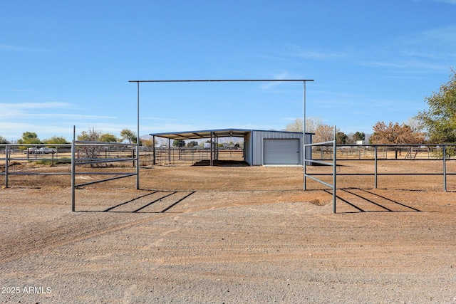 view of outbuilding with a rural view