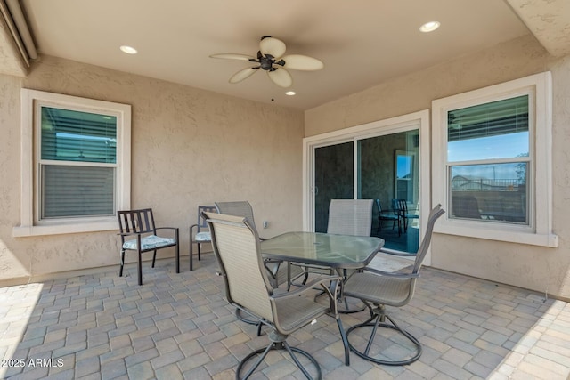 view of patio with ceiling fan