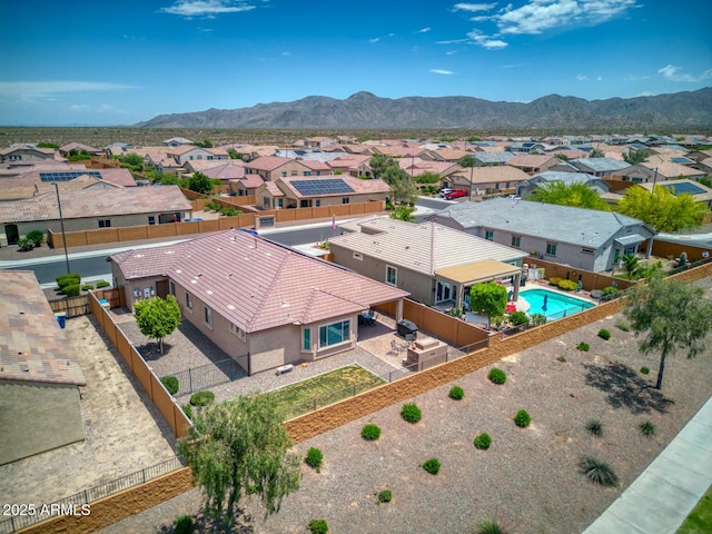 drone / aerial view featuring a mountain view