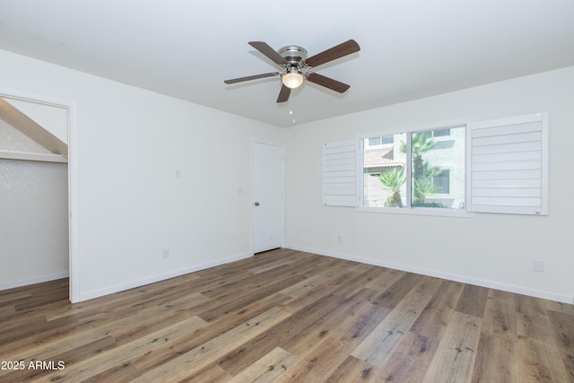 222 W Brown Rd Unit 72, Mesa, AZ 85201 - unfurnished bedroom featuring wood finished floors, baseboards, and a closet