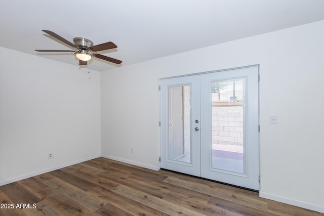 222 W Brown Rd Unit 72, Mesa, AZ 85201 - spare room with wood finished floors, a ceiling fan, baseboards, and french doors